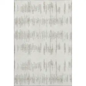 Photo of Ivory And Beige Striped Washable Area Rug With UV Protection