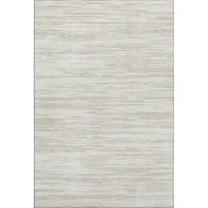 Photo of Ivory And Beige Striped Washable Area Rug With UV Protection