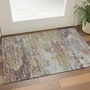 Photo of Ivory And Beige Striped Washable Area Rug With UV Protection