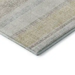 Photo of Ivory And Beige Striped Washable Area Rug With UV Protection