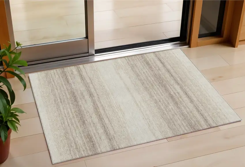 Ivory And Beige Striped Washable Indoor Outdoor Area Rug Photo 1