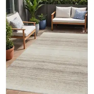 Photo of Ivory And Beige Striped Washable Indoor Outdoor Area Rug