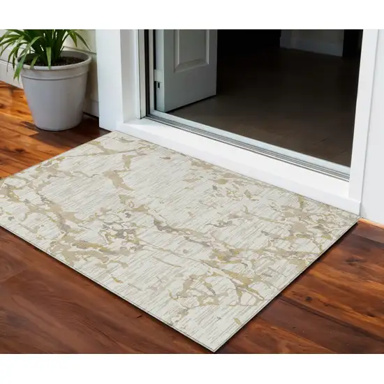 Ivory And Beige Striped Washable Indoor Outdoor Area Rug Photo 1