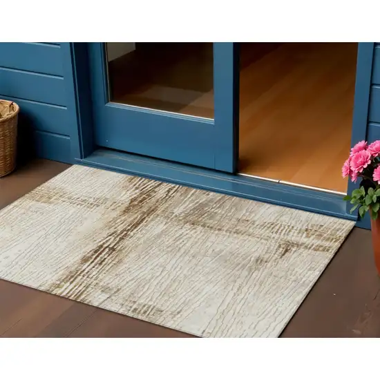 Ivory And Beige Striped Washable Indoor Outdoor Area Rug Photo 2