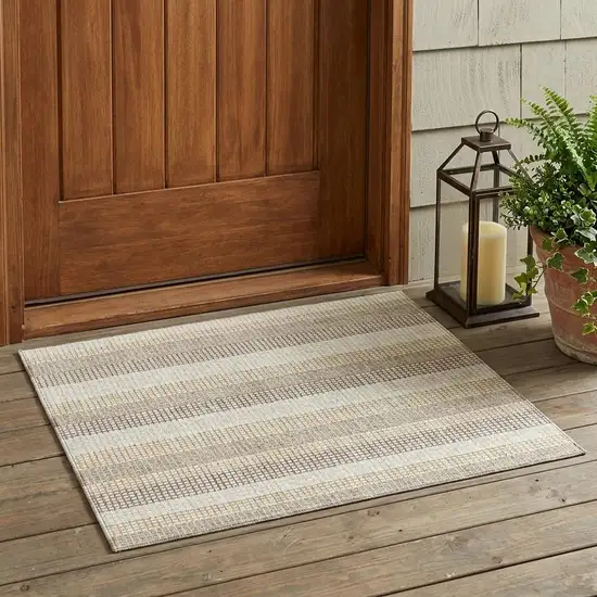 Ivory And Beige Striped Washable Indoor Outdoor Area Rug Photo 1