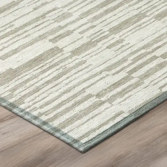 Ivory And Beige Striped Washable Indoor Outdoor Area Rug Photo 4