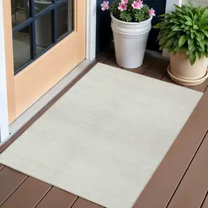 Photo of Ivory And Beige Striped Washable Indoor Outdoor Area Rug