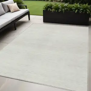 Photo of Ivory And Beige Striped Washable Indoor Outdoor Area Rug