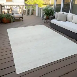 Photo of Ivory And Beige Striped Washable Indoor Outdoor Area Rug