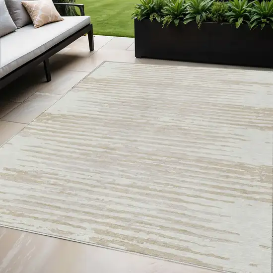 Ivory And Beige Striped Washable Indoor Outdoor Area Rug Photo 1