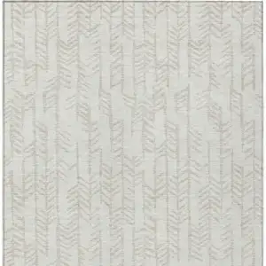 Photo of Ivory And Beige Tribal Washable Indoor Outdoor Area Rug