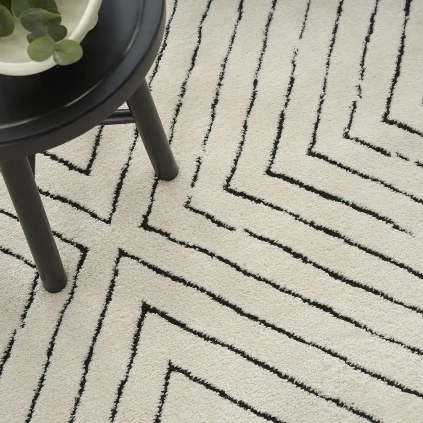 Ivory And Black Abstract Area Rug Photo 8