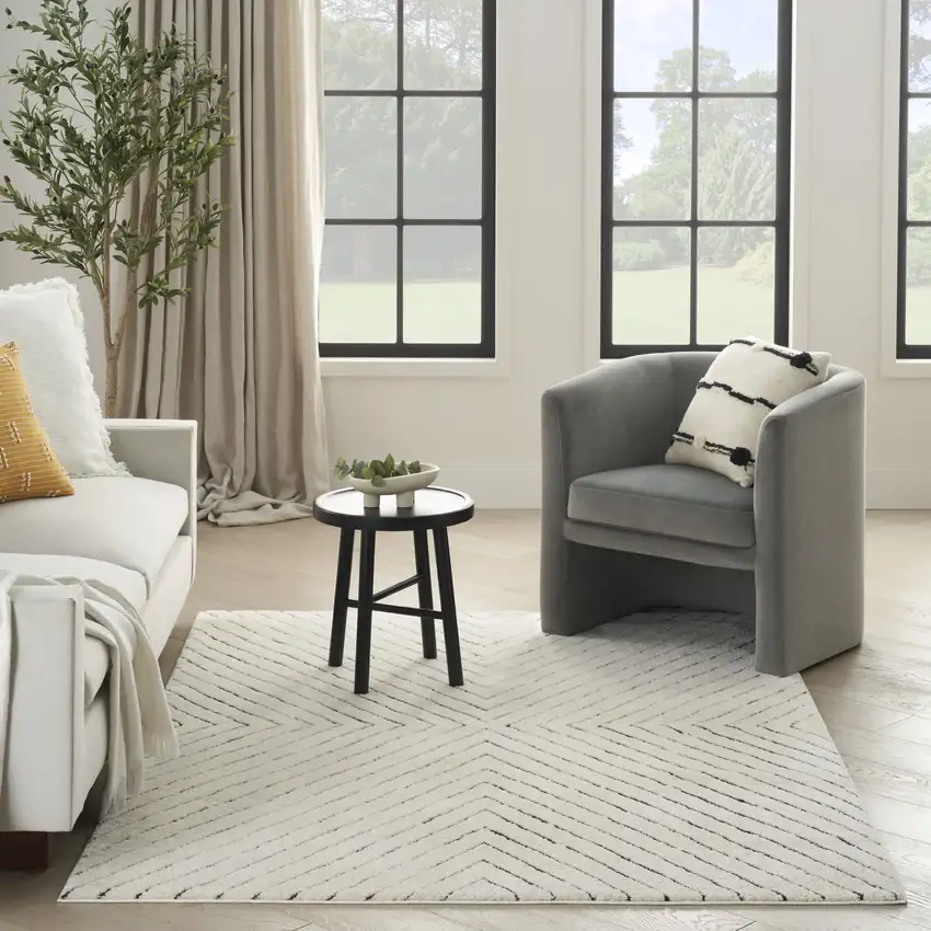 Ivory And Black Abstract Area Rug Photo 5