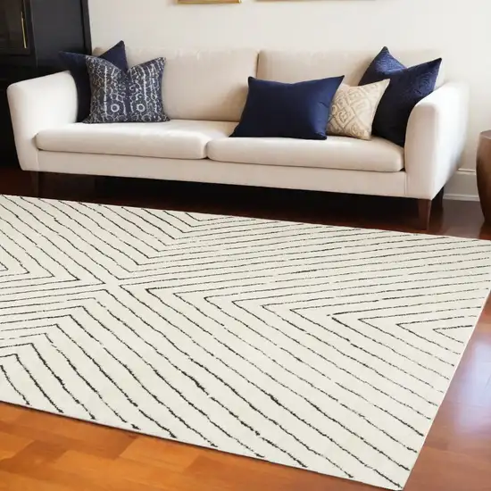 Ivory And Black Abstract Area Rug Photo 1
