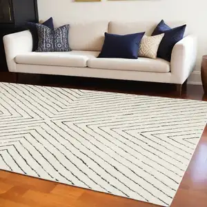 Photo of Ivory And Black Abstract Area Rug