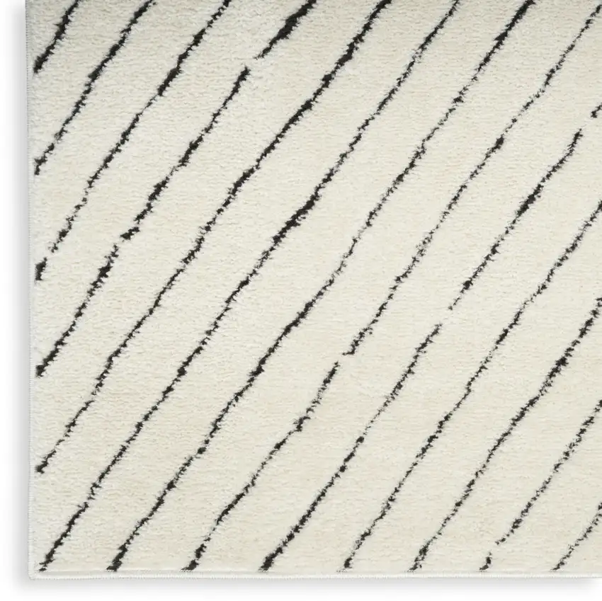 Ivory And Black Abstract Area Rug Photo 7