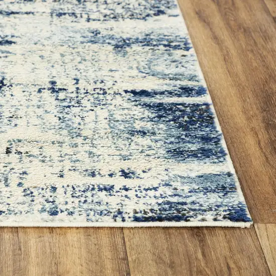 Ivory And Black Abstract Area Rug Photo 3