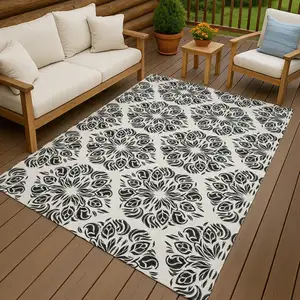 Photo of Ivory And Black Damask Washable Indoor Outdoor Area Rug