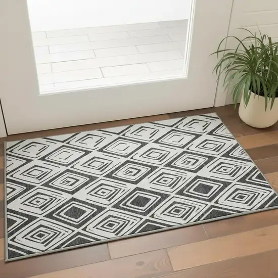Ivory And Black Diamond Washable Area Rug With UV Protection Photo 2