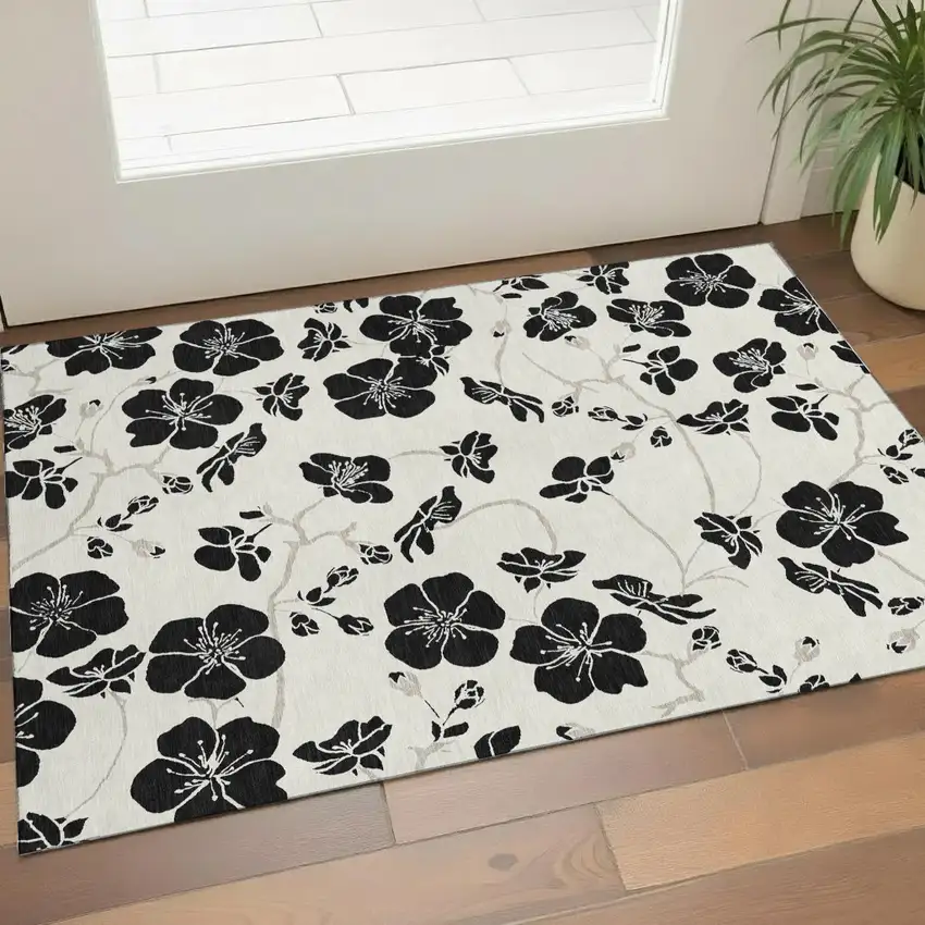 Ivory And Black Floral Washable Area Rug With UV Protection Photo 1
