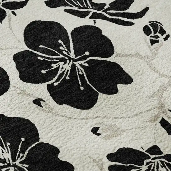 Ivory And Black Floral Washable Area Rug With UV Protection Photo 1