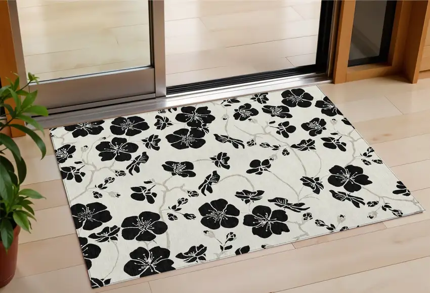Ivory And Black Floral Washable Indoor Outdoor Area Rug Photo 1