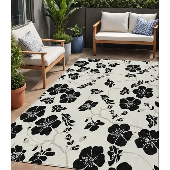 Ivory And Black Floral Washable Indoor Outdoor Area Rug Photo 1