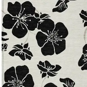 Photo of Ivory And Black Floral Washable Indoor Outdoor Area Rug