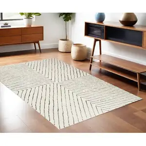 Photo of Ivory And Black Geometric Area Rug