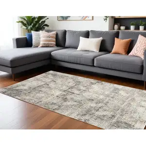 Photo of Ivory And Black Geometric Area Rug