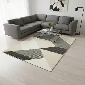 Photo of Ivory And Black Geometric Area Rug