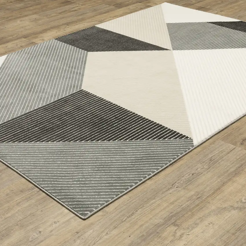 Ivory And Black Geometric Area Rug Photo 9