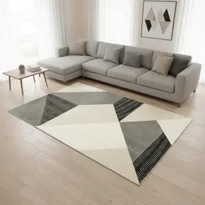 Photo of Ivory And Black Geometric Area Rug
