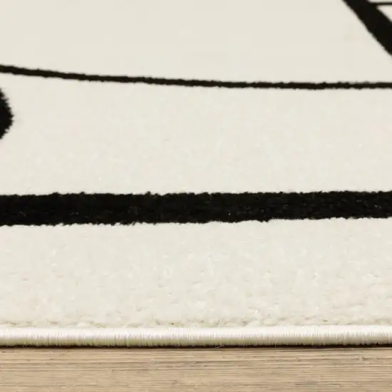 Ivory And Black Geometric Area Rug Photo 8