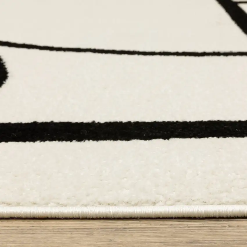 Ivory And Black Geometric Area Rug Photo 8