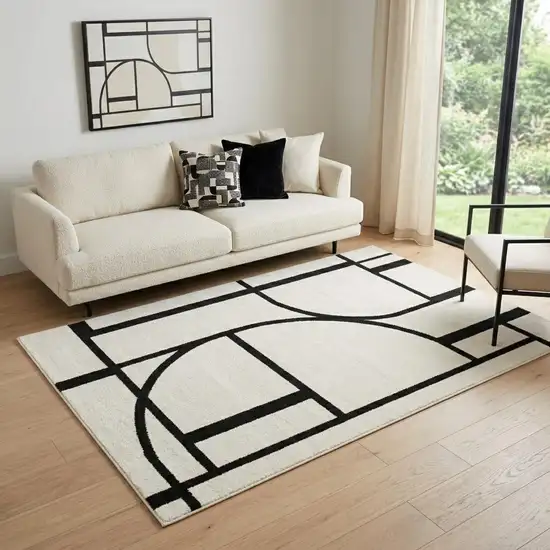 Ivory And Black Geometric Area Rug Photo 1