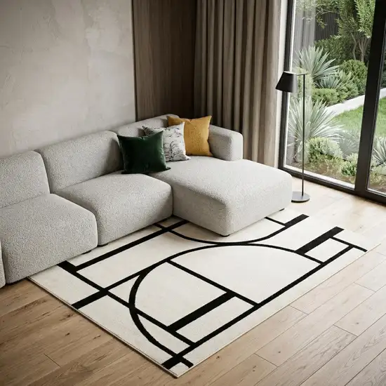Ivory And Black Geometric Area Rug Photo 1