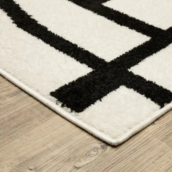 Ivory And Black Geometric Area Rug Photo 6