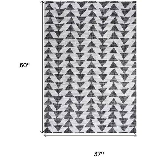 Ivory And Black Geometric Indoor Outdoor Area Rug Photo 3