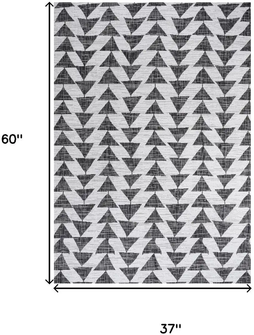 Ivory And Black Geometric Indoor Outdoor Area Rug Photo 3