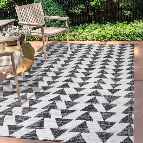 Ivory And Black Geometric Indoor Outdoor Area Rug Photo 9