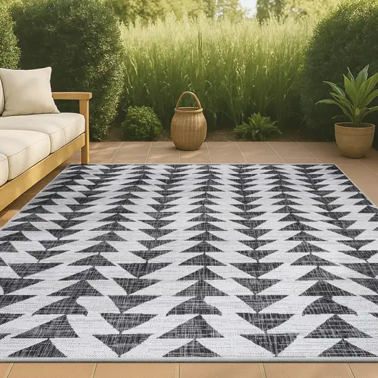 Ivory And Black Geometric Indoor Outdoor Area Rug Photo 4