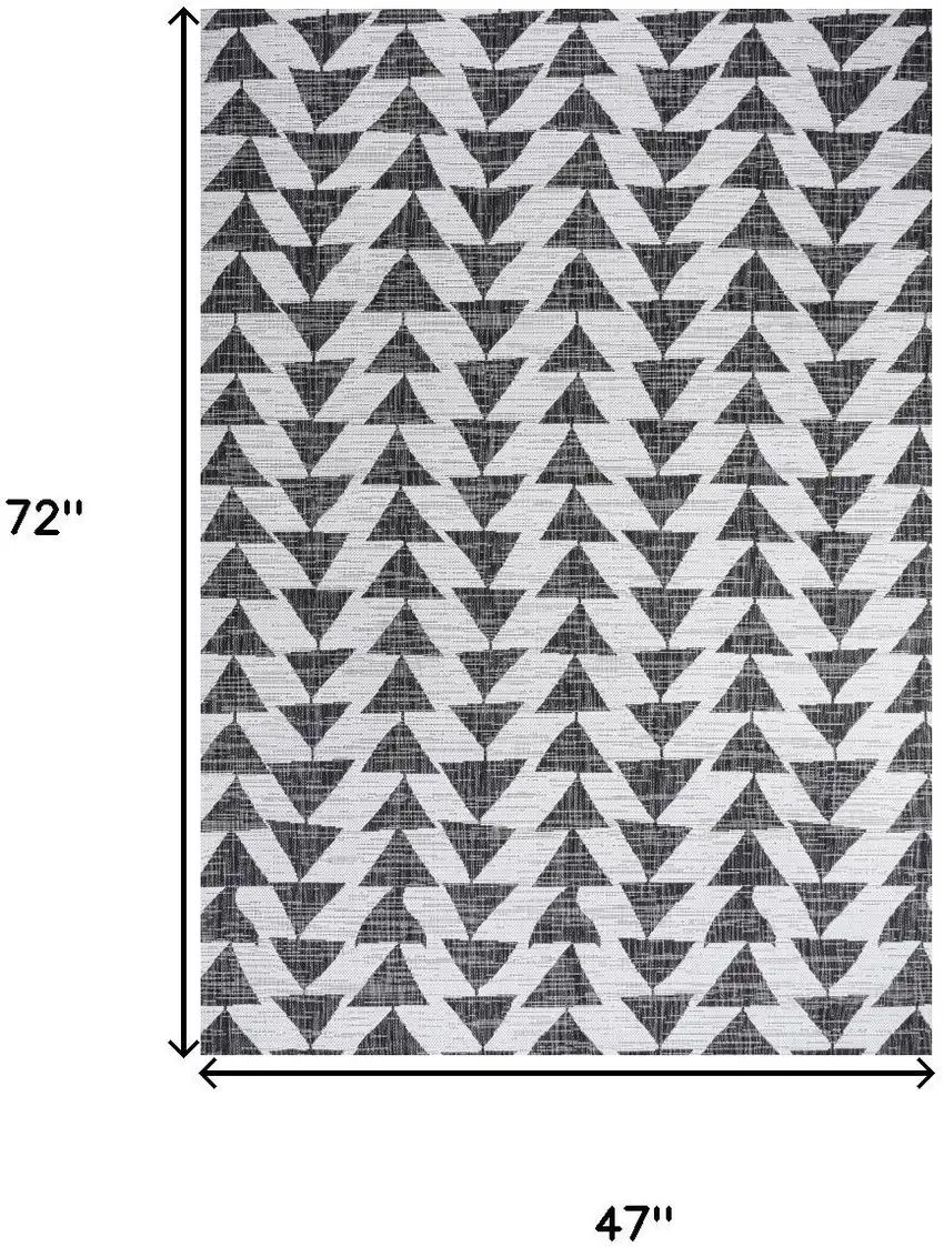 Ivory And Black Geometric Indoor Outdoor Area Rug Photo 3