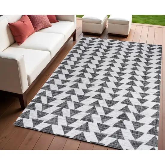 Ivory And Black Geometric Indoor Outdoor Area Rug Photo 1
