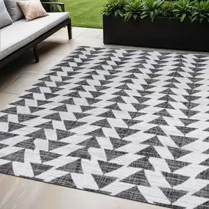 Photo of Ivory And Black Geometric Indoor Outdoor Area Rug
