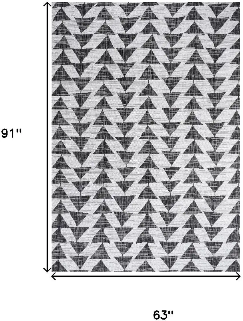 Ivory And Black Geometric Indoor Outdoor Area Rug Photo 3