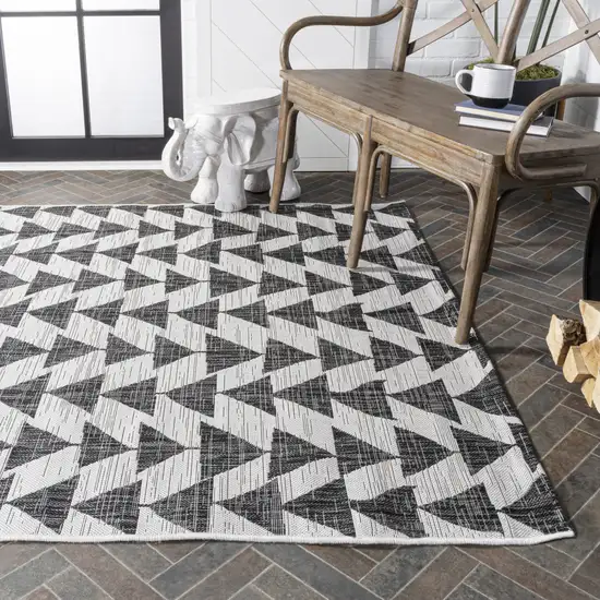 Ivory And Black Geometric Indoor Outdoor Area Rug Photo 9