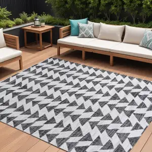 Photo of Ivory And Black Geometric Indoor Outdoor Area Rug