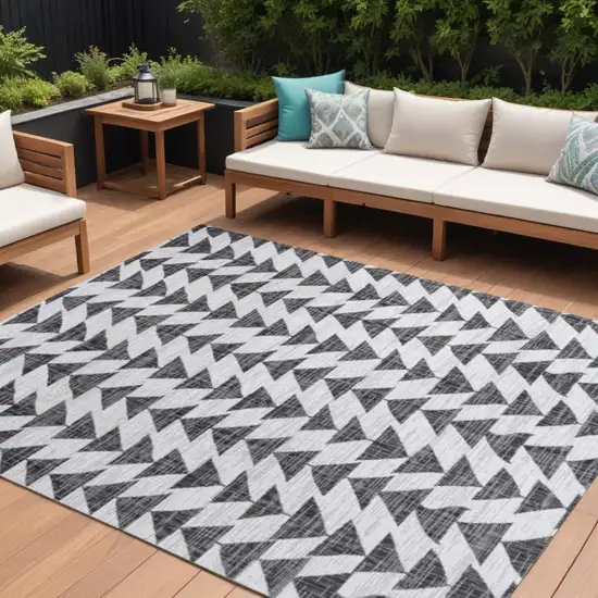 Ivory And Black Geometric Indoor Outdoor Area Rug Photo 1
