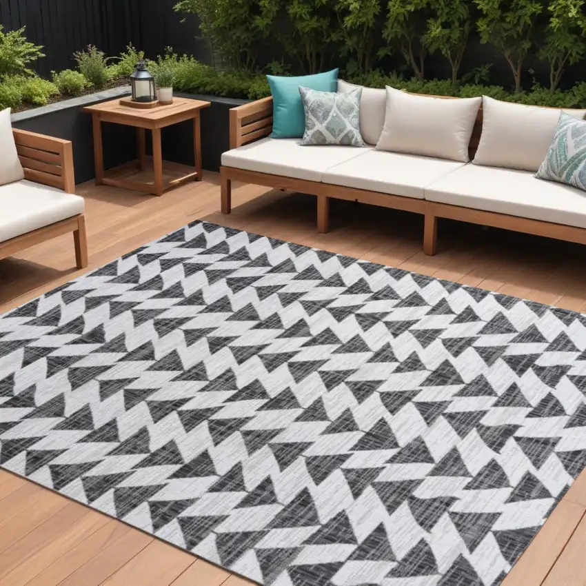 Ivory And Black Geometric Indoor Outdoor Area Rug Photo 1